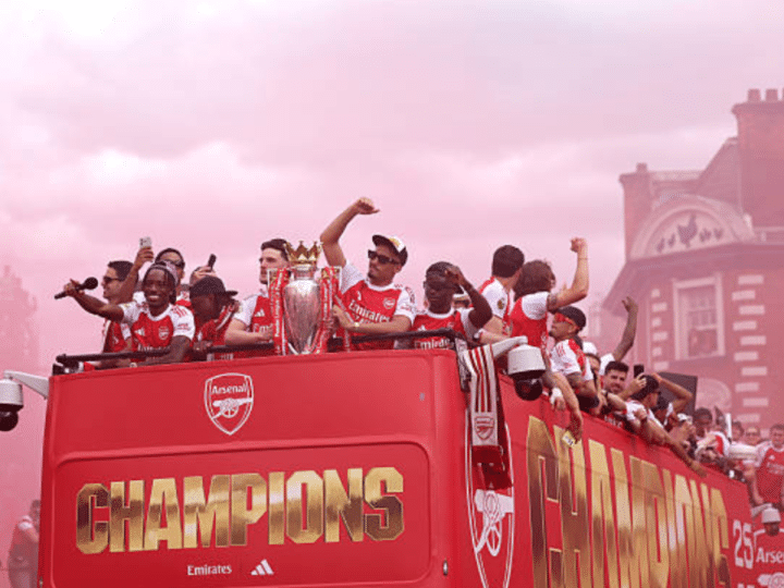 Arsenal crowned champions as fans protest sponsor Deel