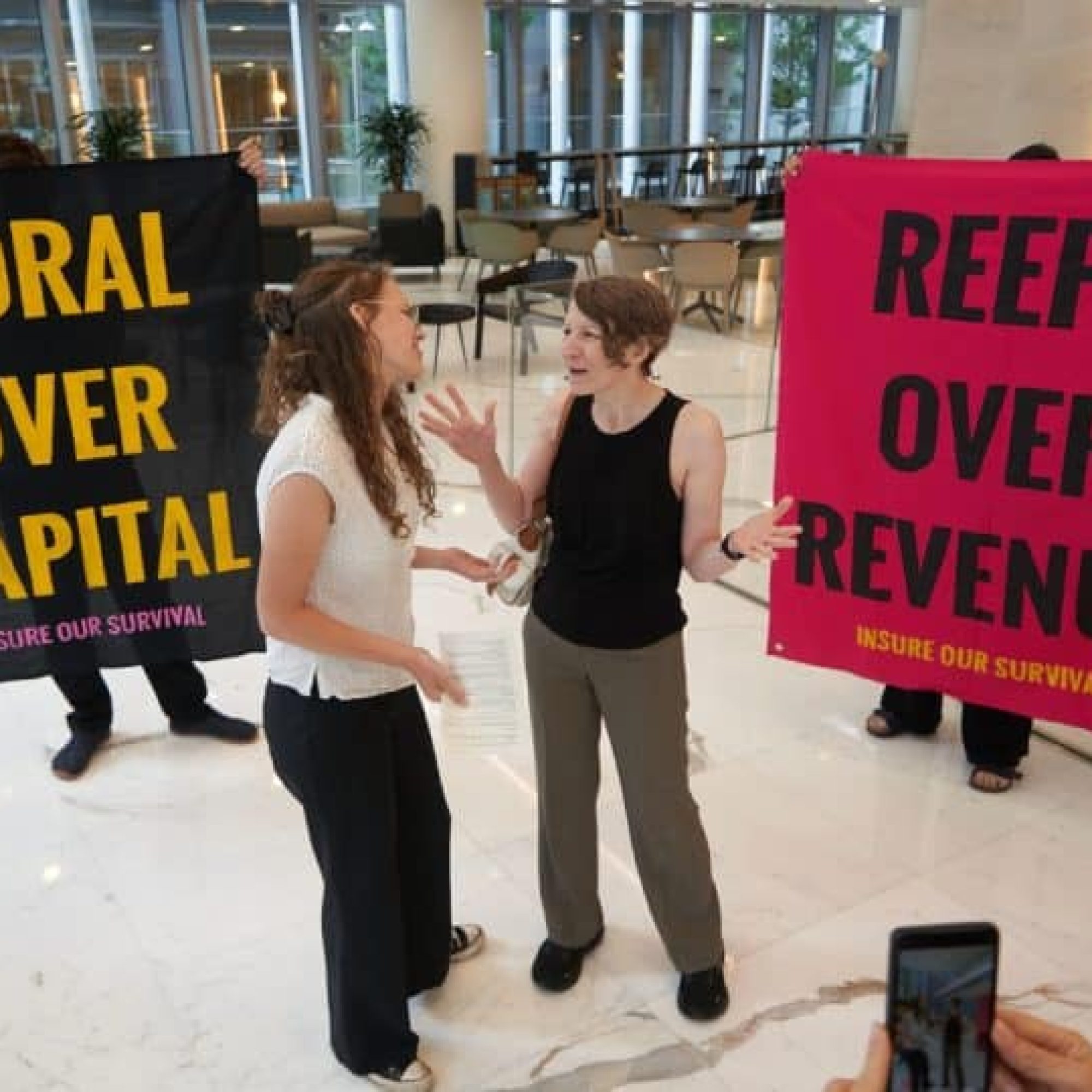 Activists occupy London’s Walkie Talkie to denounce insurance of destruction in the Coral Triangle