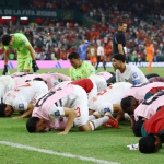 Jubilant Morocco hold their nerve to reach World Cup last 16