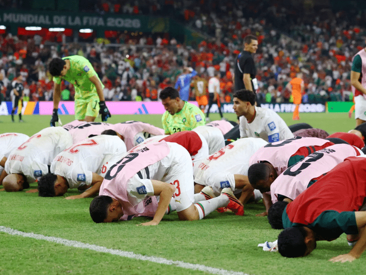 Jubilant Morocco hold their nerve to reach World Cup last 16